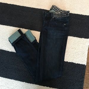 Dark denim wash studded skinny jeans